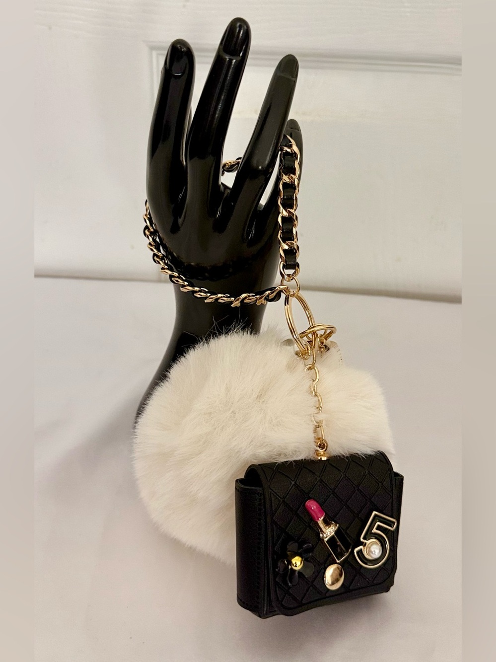 Black Quilted Mini Bag Charm with Cream Fur Pom Pom
